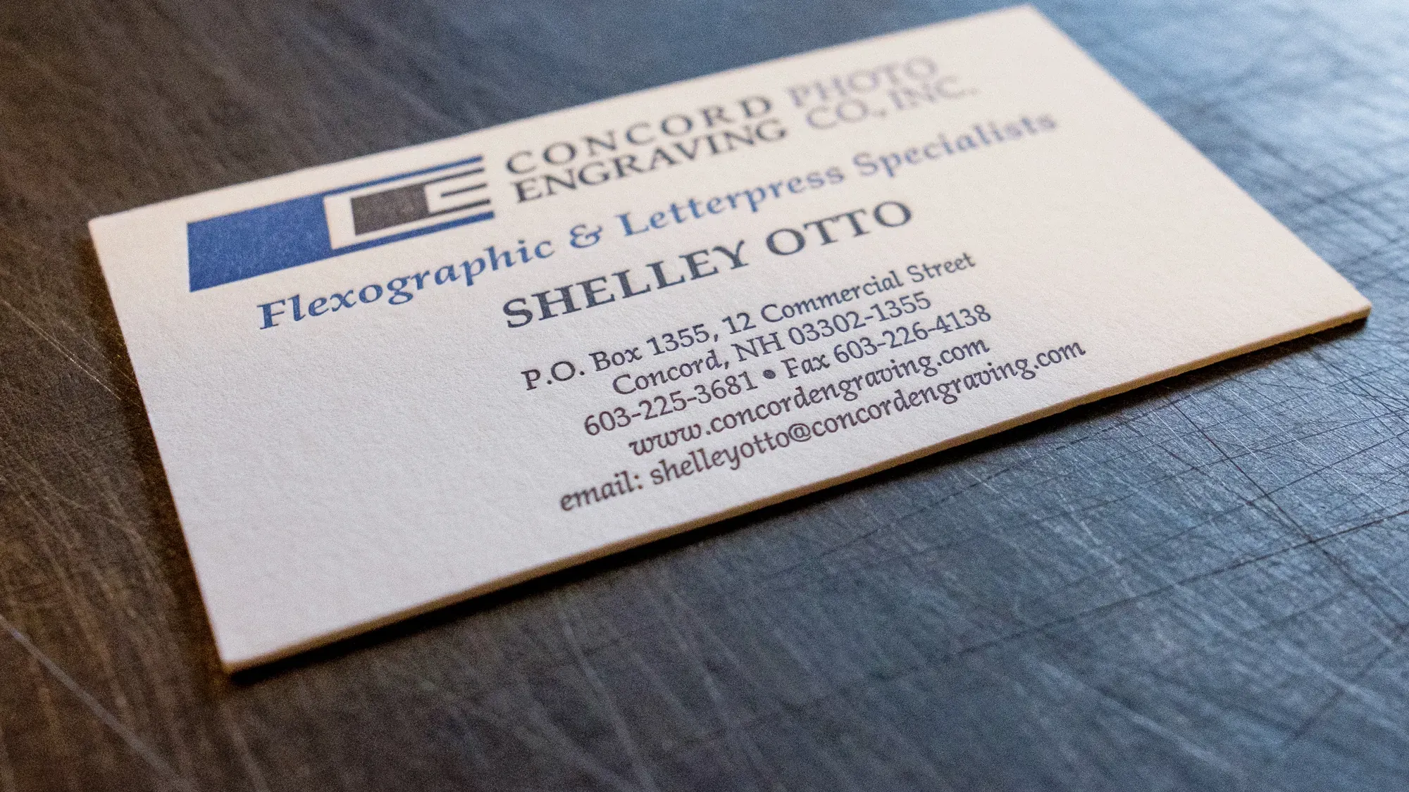 The Concord Photo Engraving business card, letterpress printed with a debossed logo